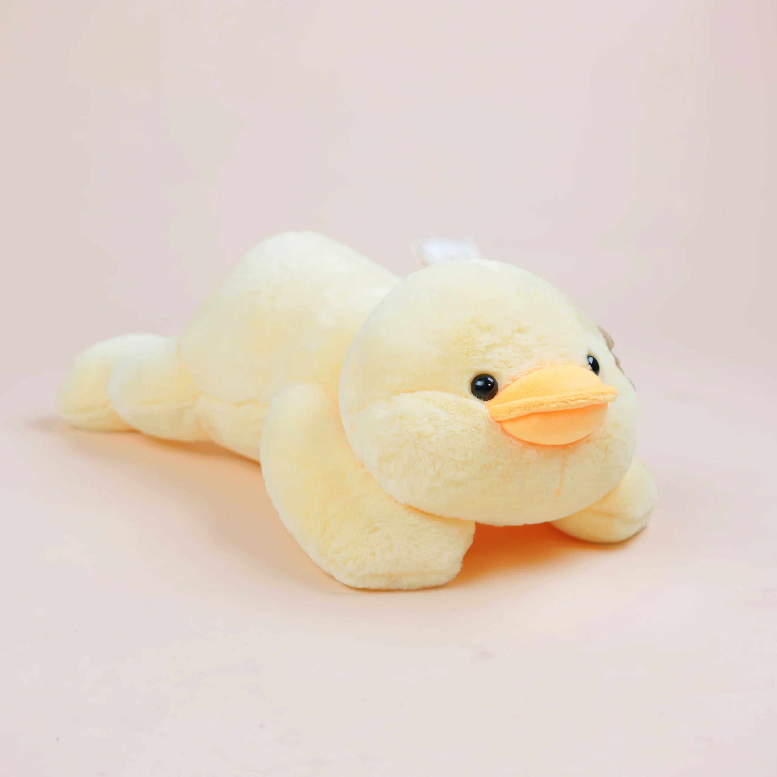 https://makbaktoy.com/wp-content/uploads/2023/03/small-super-soft-lying-duck-plush-toy-for-anxiety-scaled.webp